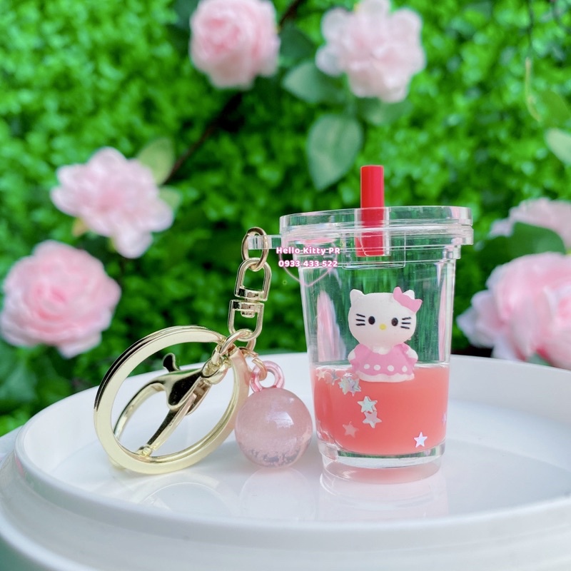 Móc khóa ly nước Hello Kitty có hạt kim tuyến