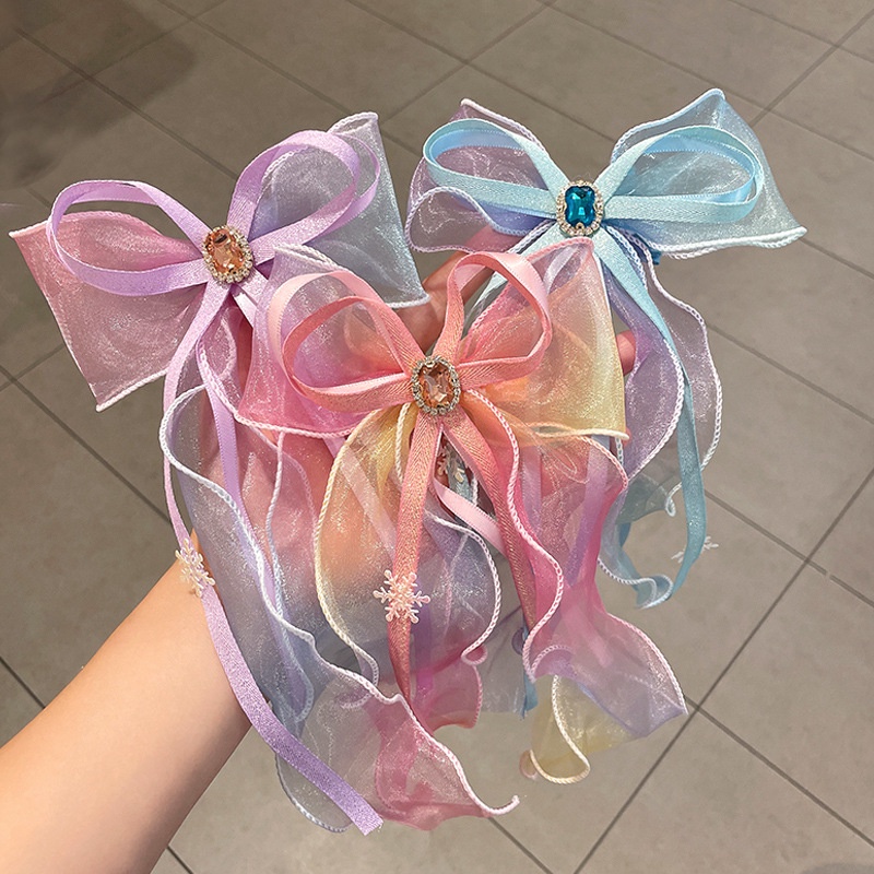 Kẹp tóc cho bé gái hình nơ voan dễ thương