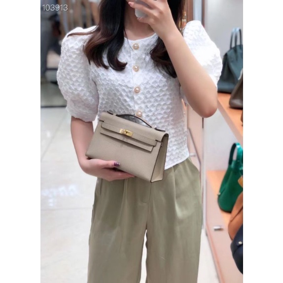 Túi xách HM màu ghi.