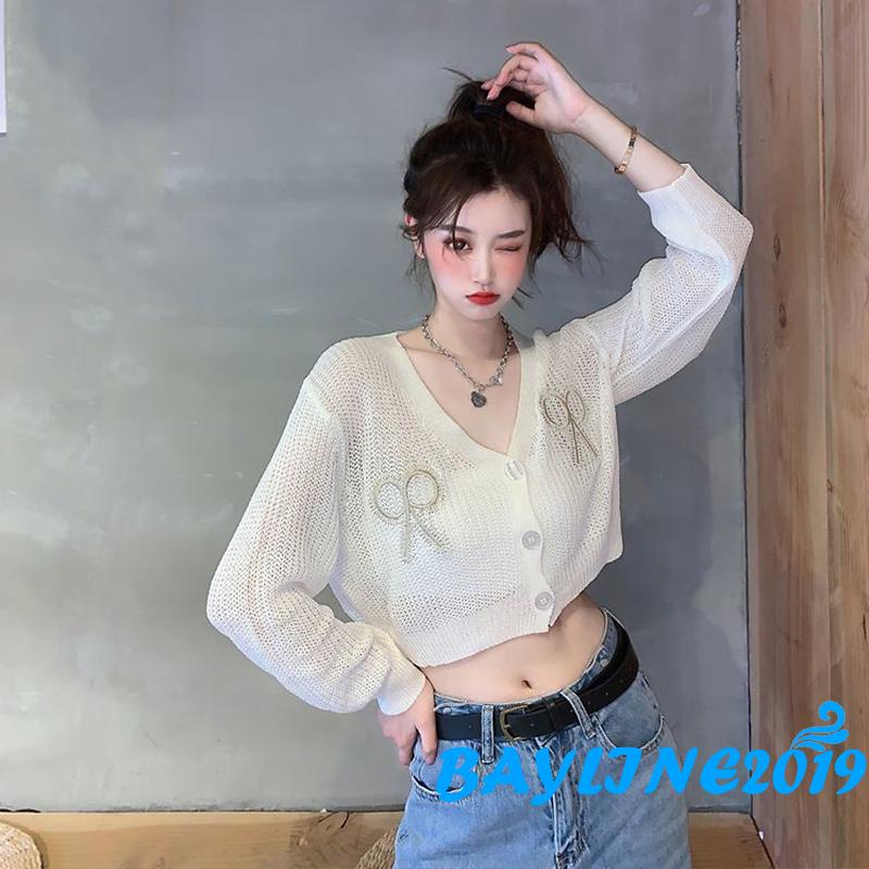 Áo croptop dệt kim tay dài cổ chữ V thêu họa tiết thắt nơ thời trang cho nữ