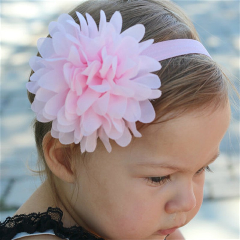Băng đô gắn họa tiết hoa trơn màu xinh xắn cho bé gái