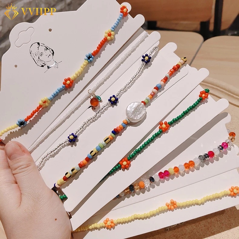 Vòng cổ choker chuỗi hạt gạo phối hình bướm trái tim đầy màu sắc kiểu cho nữ