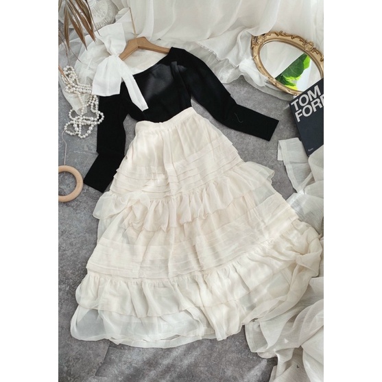 SET ÁO ĐEN LỆCH VAI PHỐI NƠ TRẮNG + CHÂN VÁY MIDI TRẮNG Sét