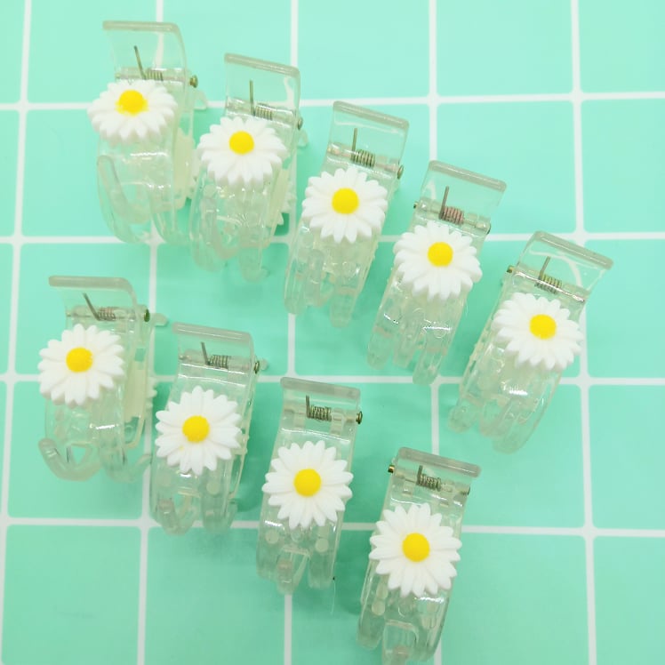 Kẹp tóc càng cua 3 răng hoa cúc trắng trong suốt