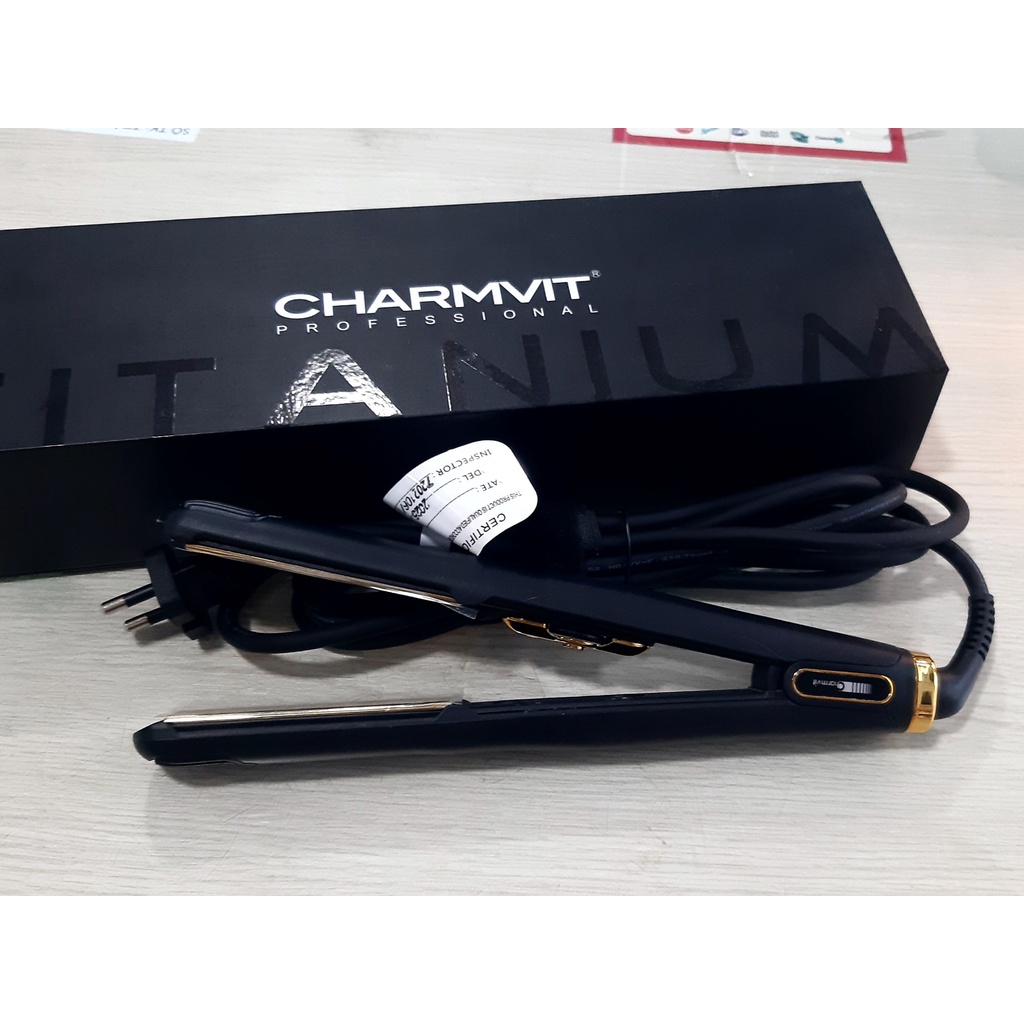 Máy là tóc thẳng là tóc cụp titanium Charmvit