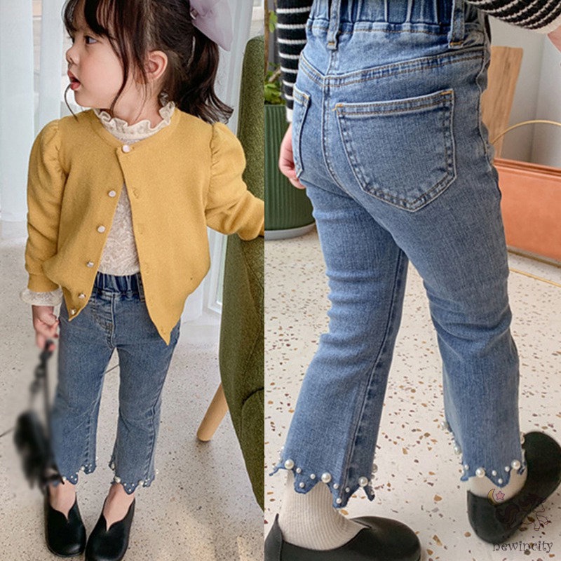 Quần jean lưng vừa đính ngọc trai nhân tạo thời trang Hàn Quốc dành cho bé gái