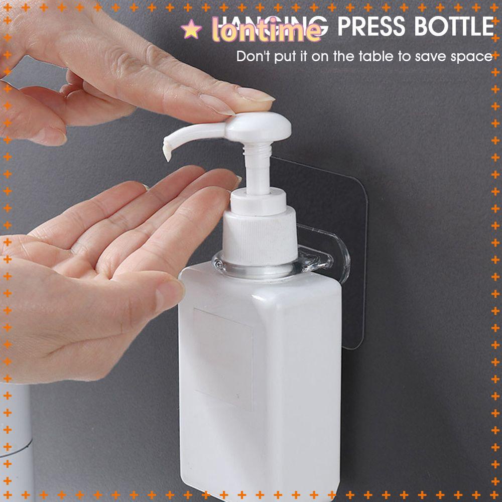 Giá treo chai dầu gội gắn tường tự dính không để lại dấu vết giá đỡ