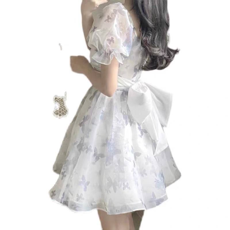 ĐẦM VOAN TRẮNG NỀN HOA ĐAN NGỰC TAY BỒNG