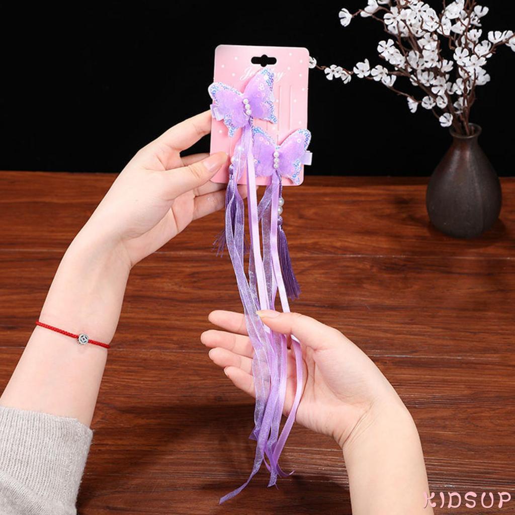 Kẹp tóc hình bươm bướm đính hạt phối tua rua dễ thương cho bé