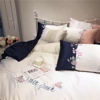 Set ga gối lụa thêu hoa hồng.