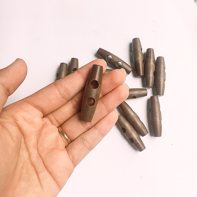 Nút nhựa giả gỗ