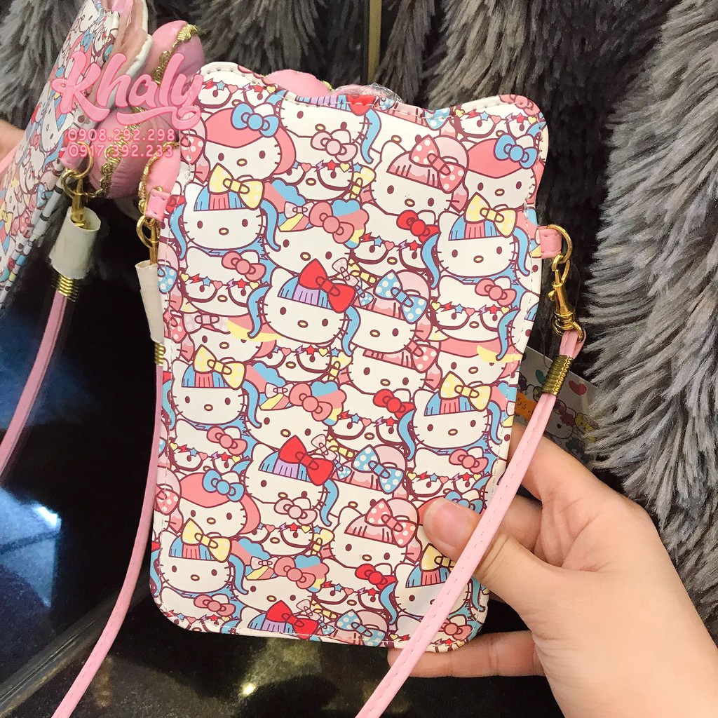 Túi tiền đựng điện thoại cầm tay có dây đeo da mền 1 ngăn hình Hello Kitty (11.5x1x18cm) màu trắng cho bé gái, bạn nữ