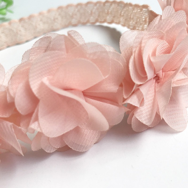 Băng đô gài tóc hoa xinh xắn dễ chịu cho bé gái