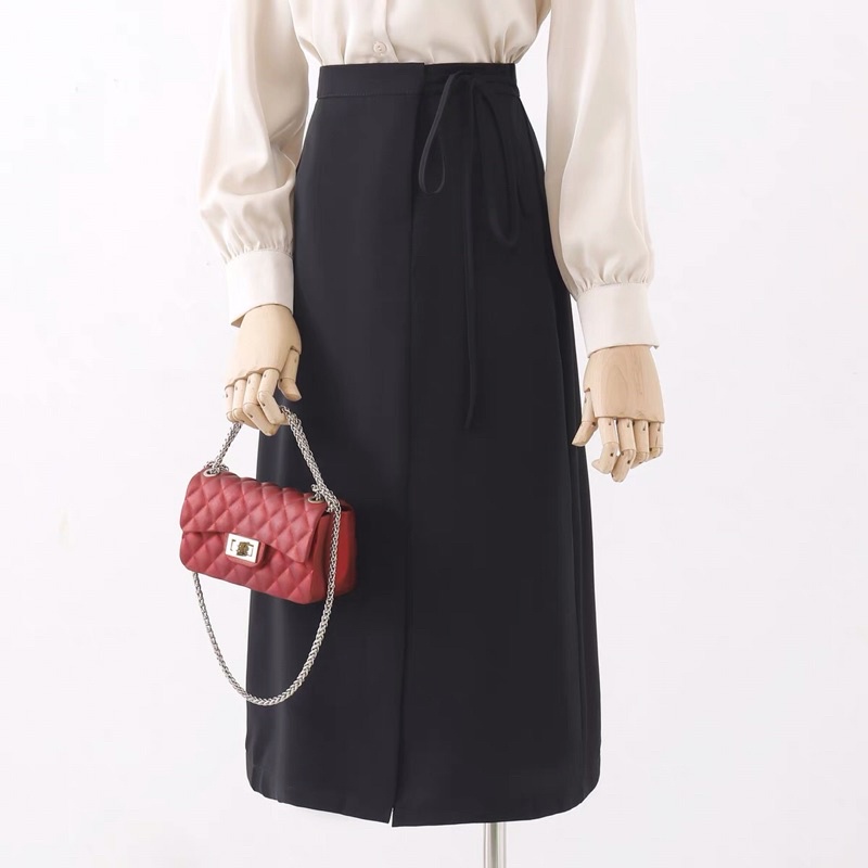 Chân váy chữ a công sở dáng dài xẻ trước thắt dây nơ nhỏ một bên, chân váy công sở chữ a dáng dài GUAN