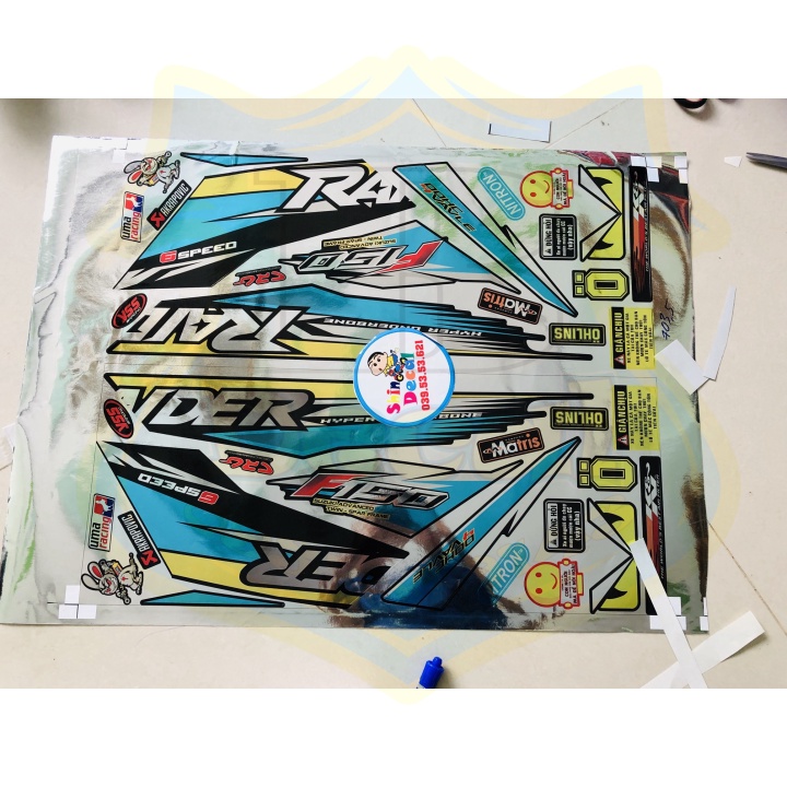 ( Quí khách vui lòng mang ra tiệm cho thợ dán ) Tem raider fi chất liệu crom