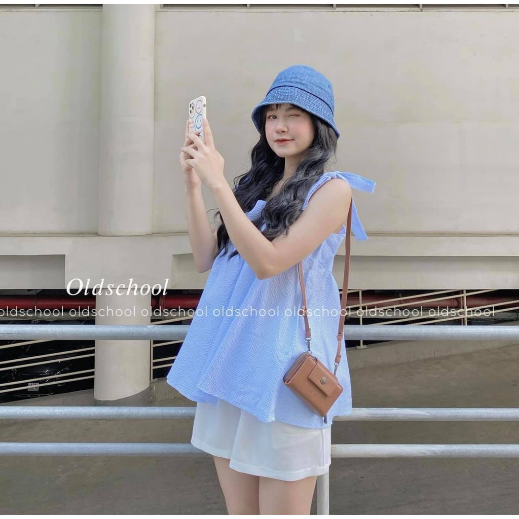 Set áo babydoll 2 dây buộc nơ caro kèm quần đùi kaki ống rộng màu trắng GUU
