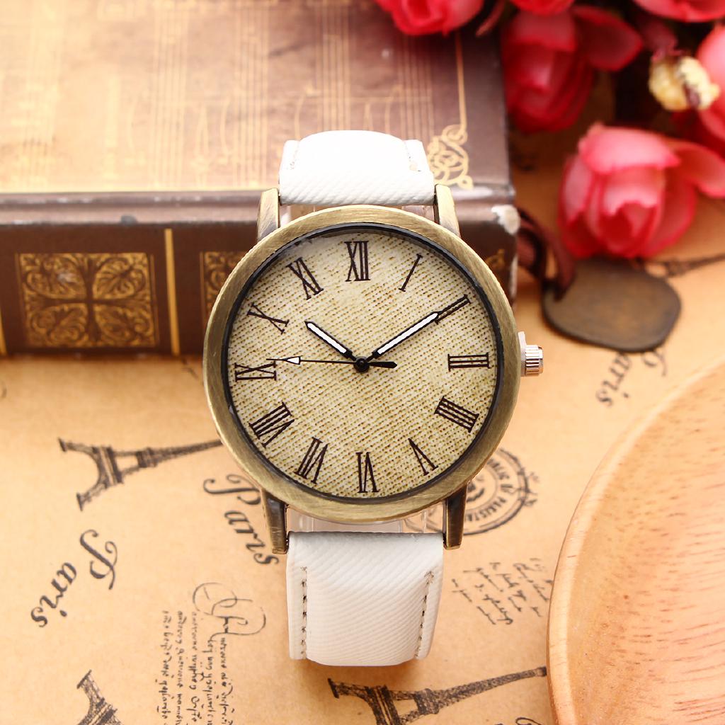 Đồng hồ analog máy quartz mặt số La Mã dây da thật