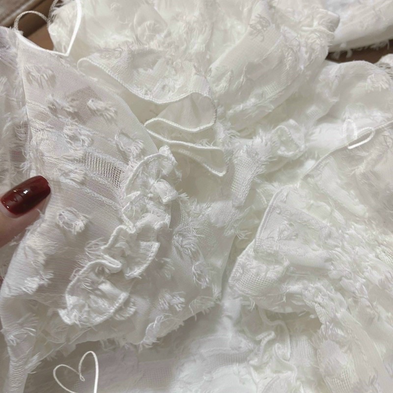 ĐẦM LÔNG VŨ TRẮNG XOÈ TAY DÀI HỞ LƯNG