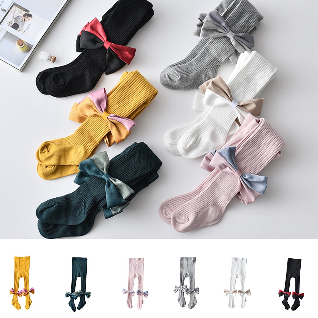 Quần liền tất màu trơn phối nơ thắt dành cho bé gái sơ sinh
