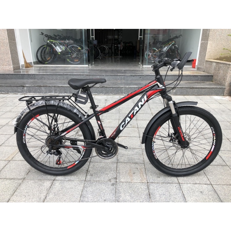 Xe đạp trẻ em CAT M360 size 24 dành cho trẻ từ 8 đến 13 tuổi có thắng đĩa trước sau và baga