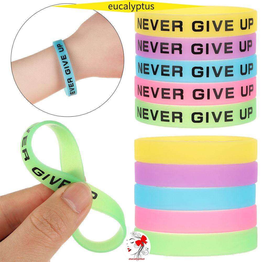 Vòng đeo tay bằng cao su silicon dạ quang mẫu chữ Never Give Up thời trang cho nam và nữ