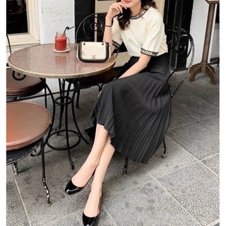 Chân váy xếp ly dài xoè cạp chun