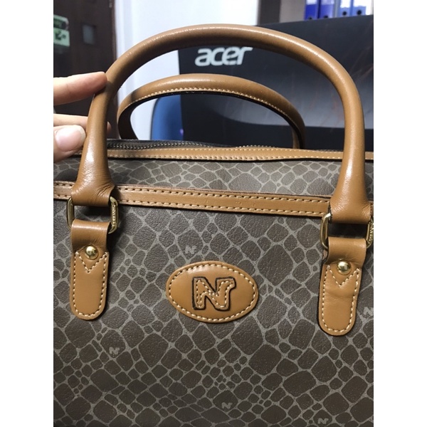 Túi da công sở dáng trống Nina Ricci - used bags