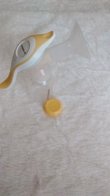 Medela Harmony like new 99% bình new