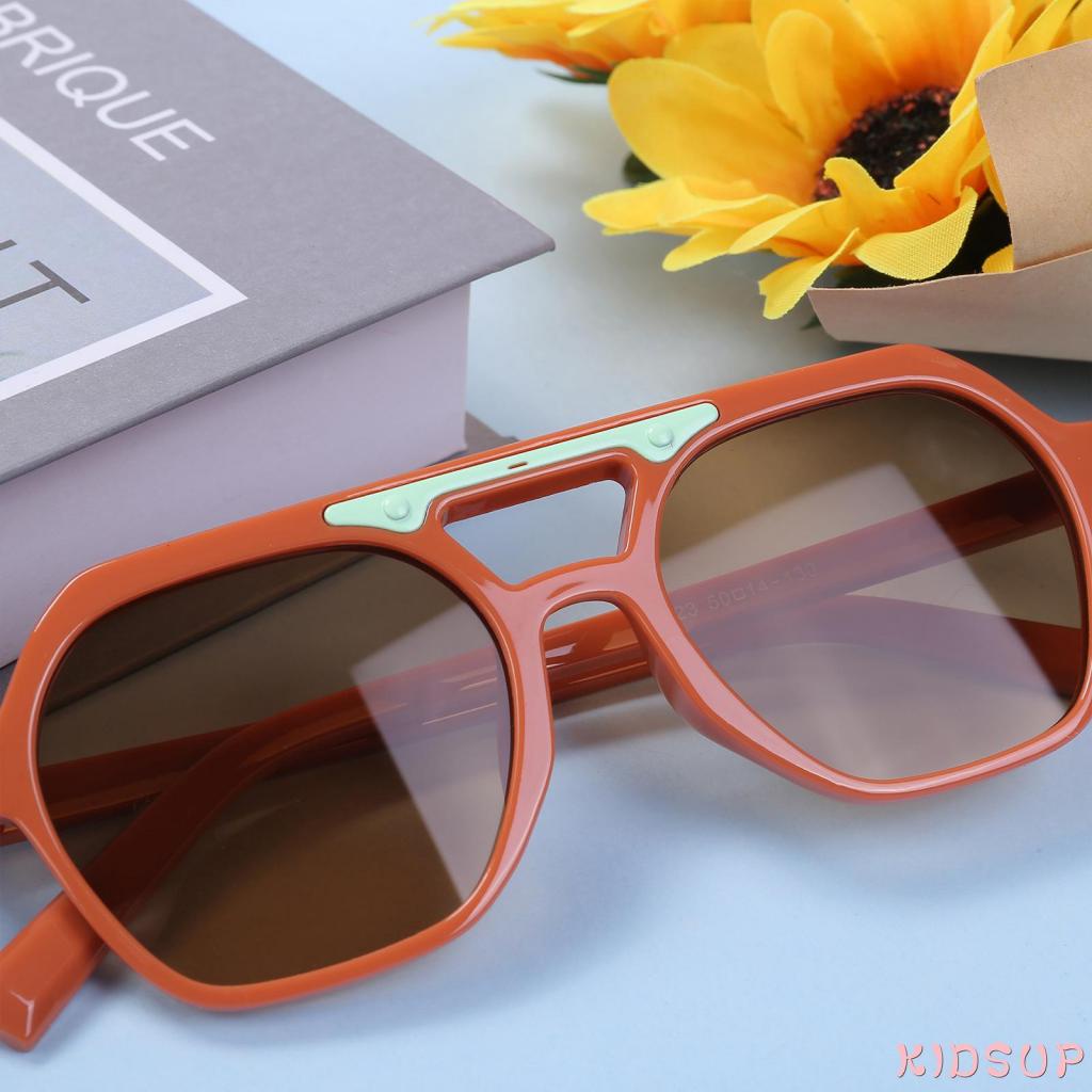 Kính mát chống tia UV màu sắc thời trang cho bé