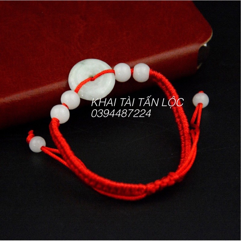 Vòng tay đồng điếu dây đỏ bằng đá chiêu tài