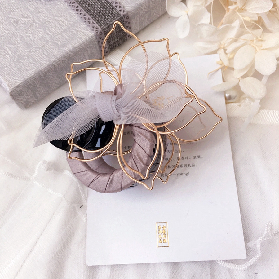 Kẹp tóc đính nơ làm đẹp cho nữ