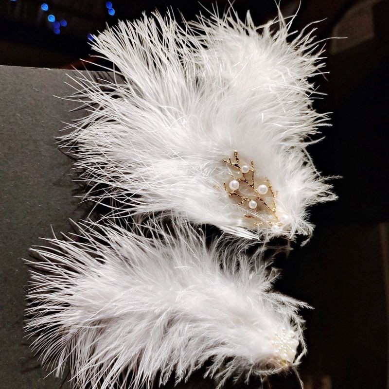 Cài tóc lông vũ màu trắng 💖💖💖
