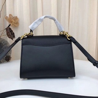 Túi Coach tabby top handle