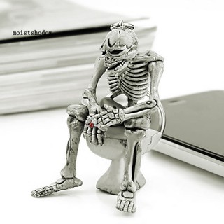 Móc khóa hình bộ xương ngồi bồn cầu độc đáo bằng cao su