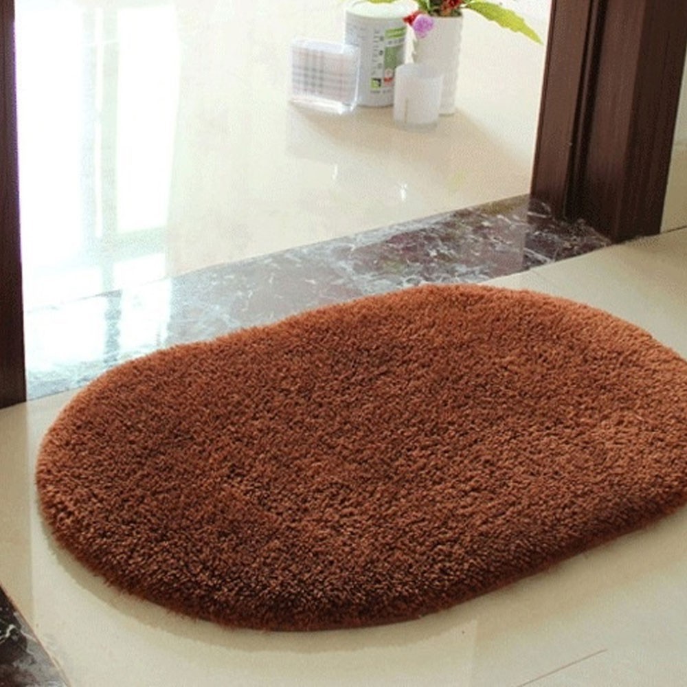 Thảm chùi chân chống trượt bằng da cừu nhân tạo hình oval kích thước 40 * 60cm tiện lợi