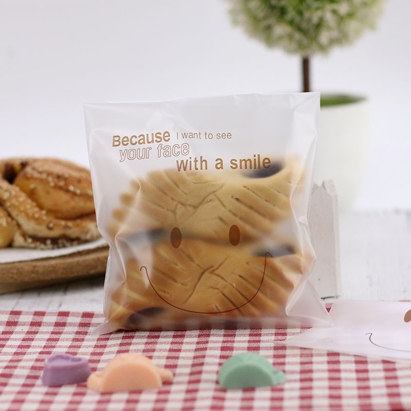 Set 100 Túi Đựng Bánh Kẹo Tự Dính Hình Mặt Cười Trong Suốt
