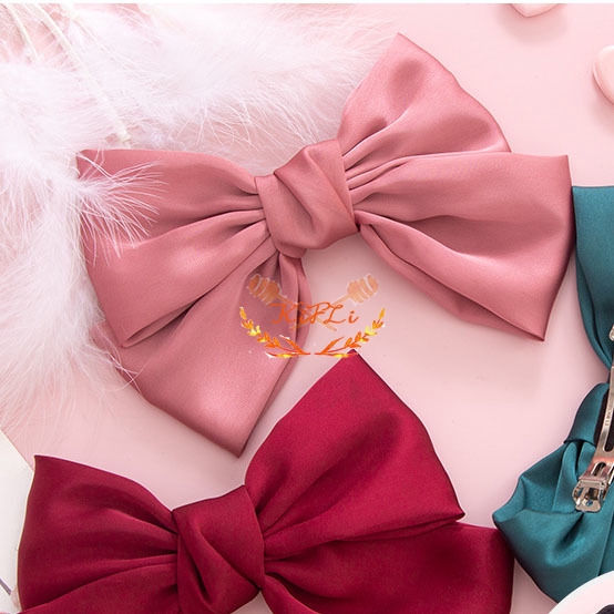 Kẹp tóc hình nơ xinh xắn dành cho nữ