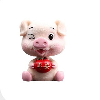 Tượng chú heo may mắn lắc lư đầu dễ thương trang trí taplo xe ô tô