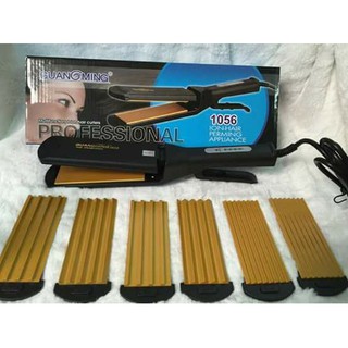 Máy duỗi dập xù tóc Guangming 1056