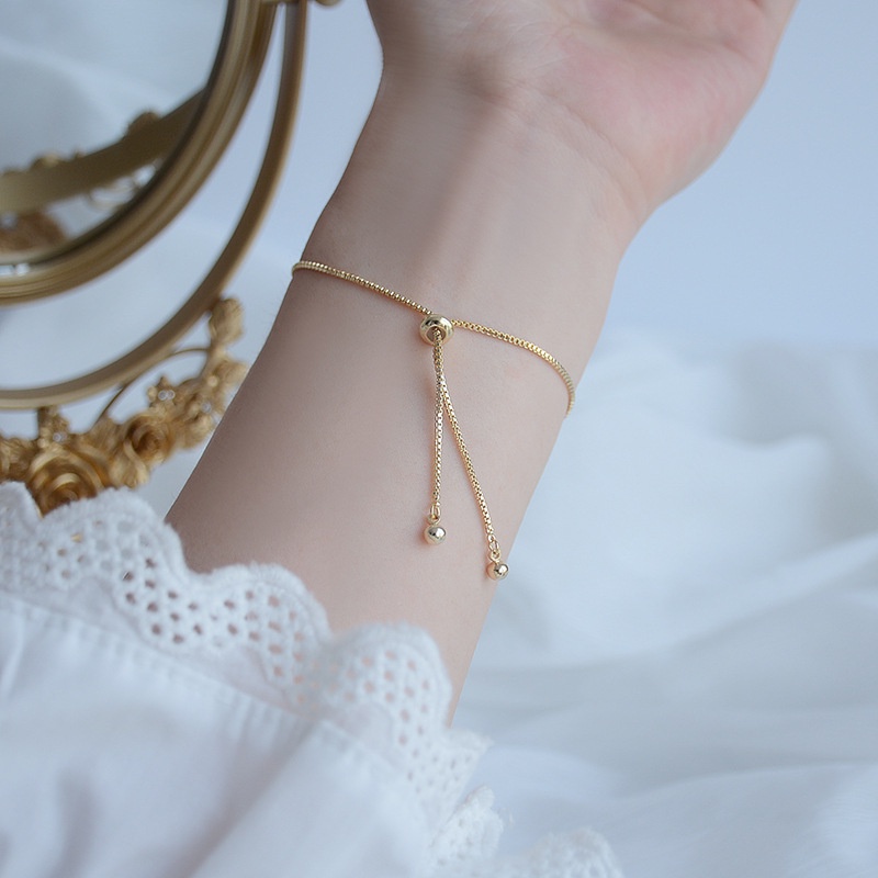 Vòng tay mạ vàng 18K đính đá zircon mặt hình cỏ bốn lá xinh xắn