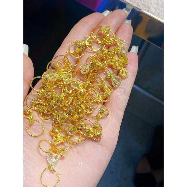 KẸP NƠ VÀNG LÀM MẶT TÚI TIỀN