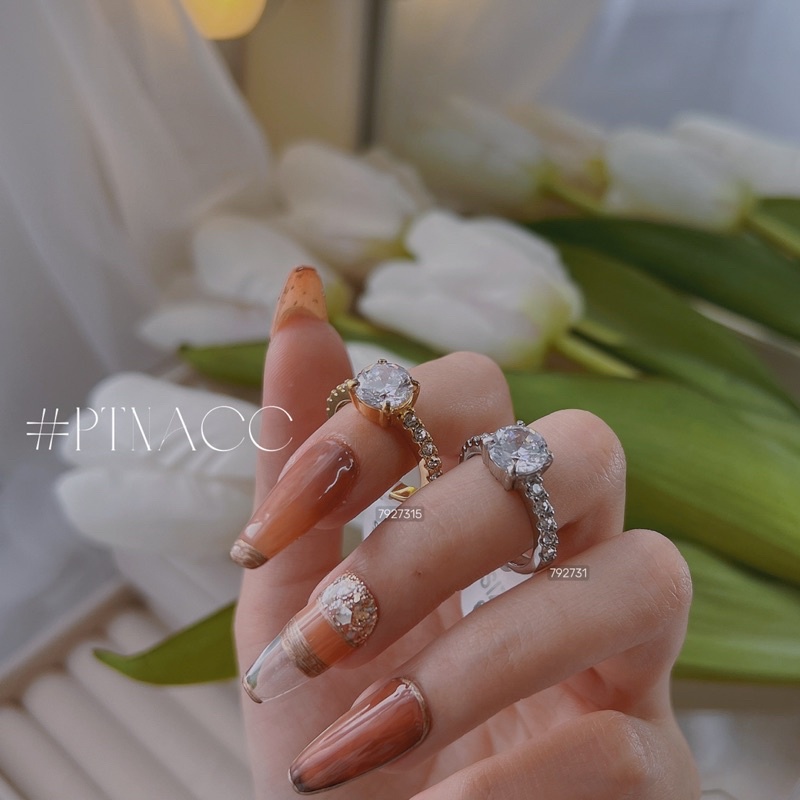 Nhẫn titan hột cao đơn giản, nhẫn nữ đính đá không đen .PTNACC.