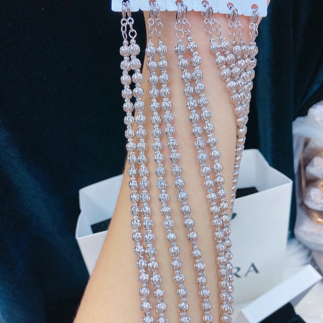Lắc nữ bi mạ bạch kim..