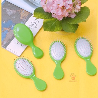 Lược gai cầm tay