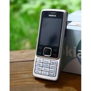 Điện thoại Nokia 6300 đầy đủ pin sạc màu bạc