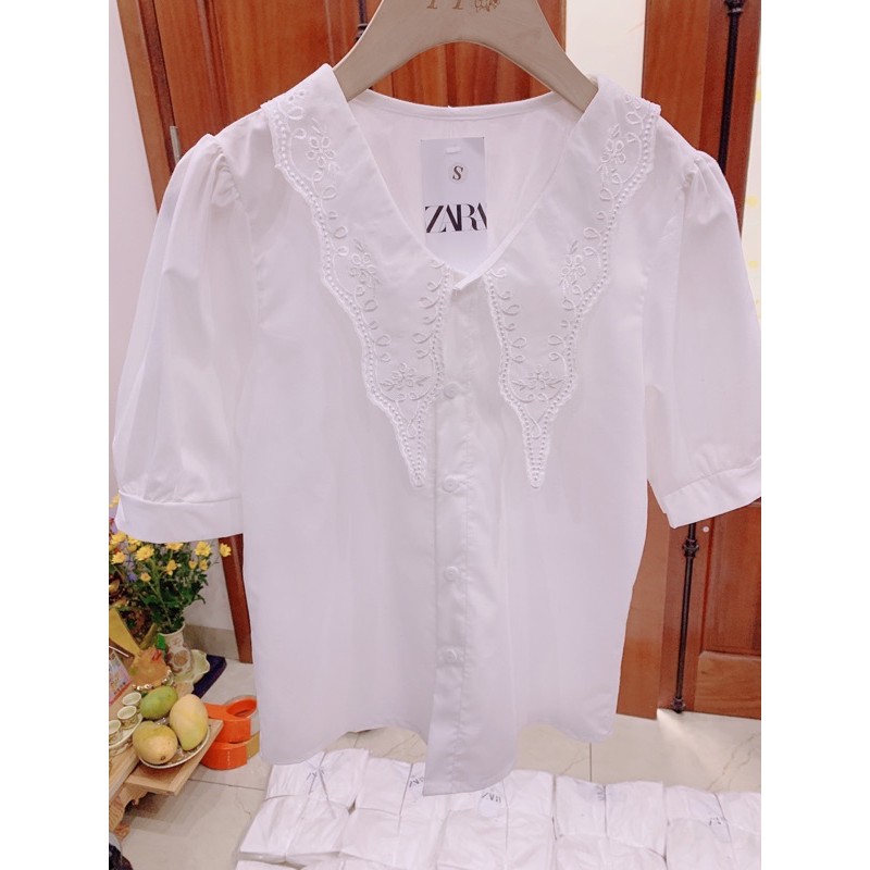 Sơ mi trắng cổ vạt thêu  vnxk