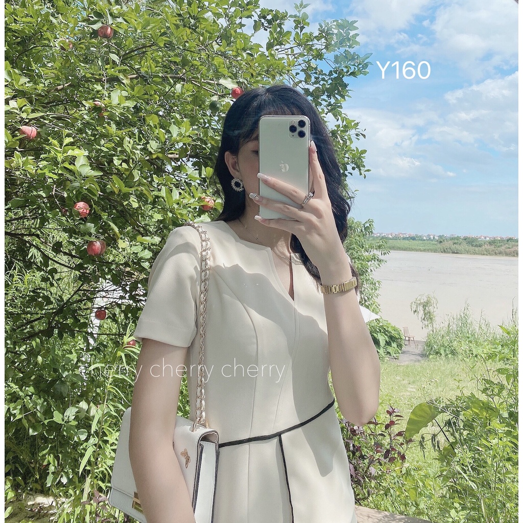 Váy văn phòng cổ V vạt eo tôn giáng tự tin