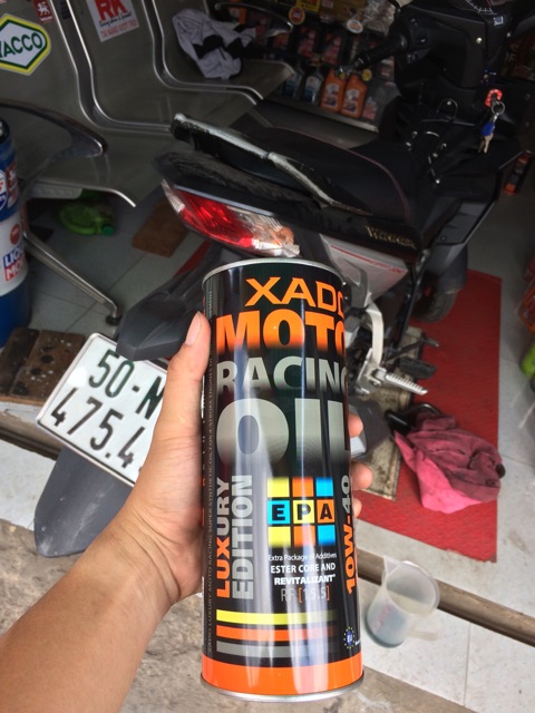 Combo 2 Lon Nhớt Xado Luxury Moto Racing Oil 10W-40 Tặng 1 Chai Rửa Xe Xado RED PENGUIN