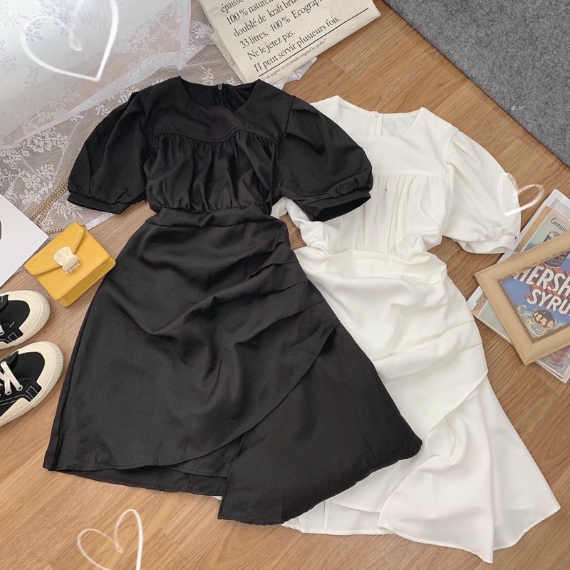 Đầm đen tay phồng vạt chéo