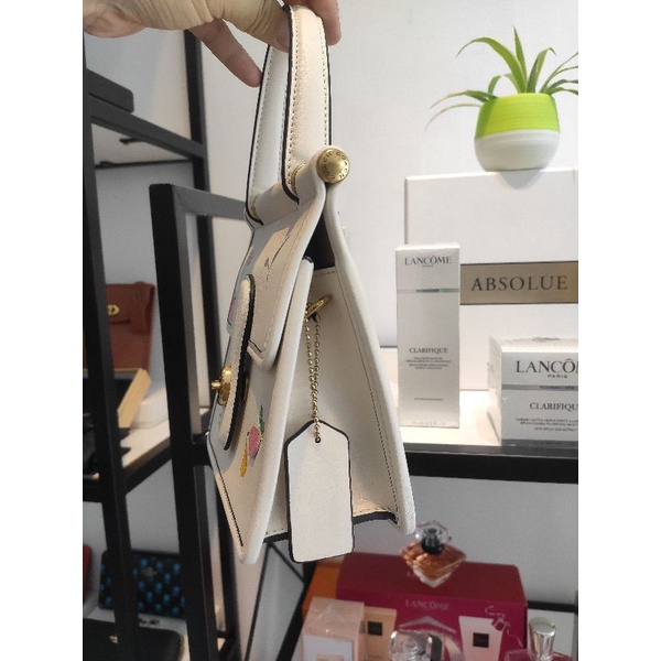 TÚI COACH TRẮNG PHỐI HOA XINH